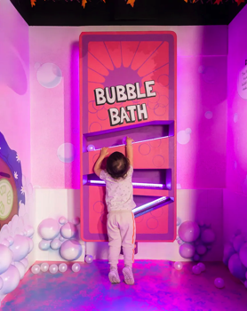 The Bubbly Lake bubble bottle, one of the interactive games in the installation, featuring a ball run and interactive LED pixel lighting and sounds.